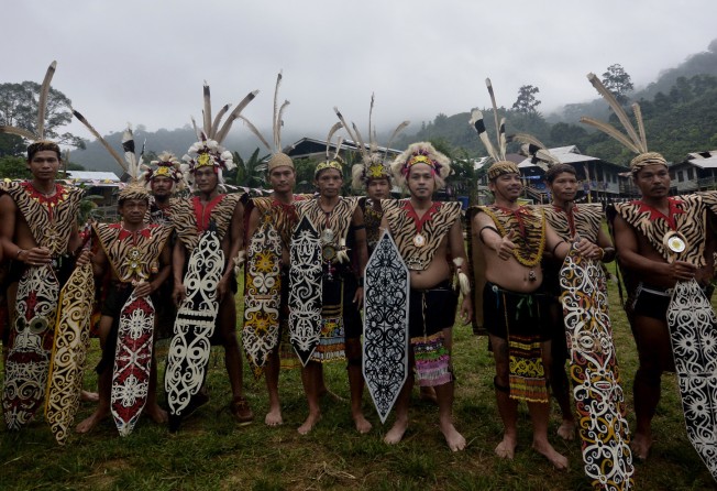 Some of the residents of Long Busang Village, in Sarawak, Malaysia. Photo: Getty Images