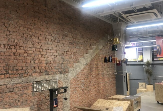 A staircase in Central Market that seems to climb across the walls. Photo: Nikolas Ettel