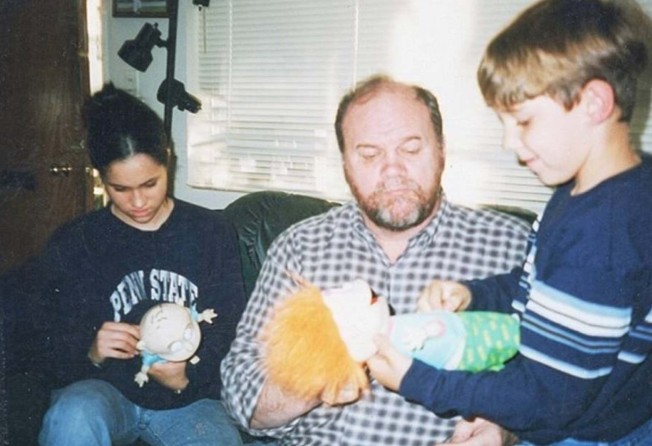 Meghan Markle (left) is seen as a youth with nephew Tyler (far right) and her father, Thomas Markle. Photo: Facebook