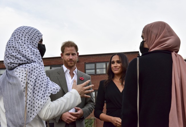 Prince Harry and Meghan Markle with Afghan refugees during their visit to Task Force Liberty at Joint Base McGuire-Dix-Lakehurst on November 13, in Burlington County, US. Photo: Archewell 