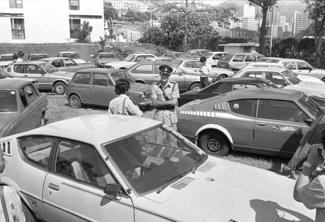 Police Superintendent Bill Duncanson surrounded by cars impounded at the Tsuen Wan Police Station on October 14, 1979, following a huge police swoop on illegal car racing on Castle Peak Road in which 37 drivers and 78 passengers were arrested. Photo: Robin Lam Kit