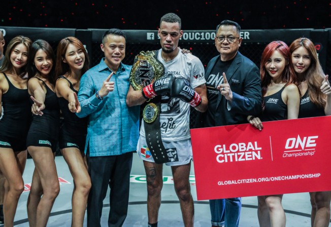 ONE lightweight kick-boxing champion Regian Eersel poses with his belt. Photo: ONE Championship.