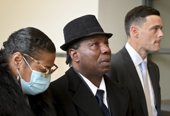 Anthony Broadwater, centre, after a judge overturned his conviction that wrongfully put him in state prison for the rape of author Alice Sebold. Photo: AP