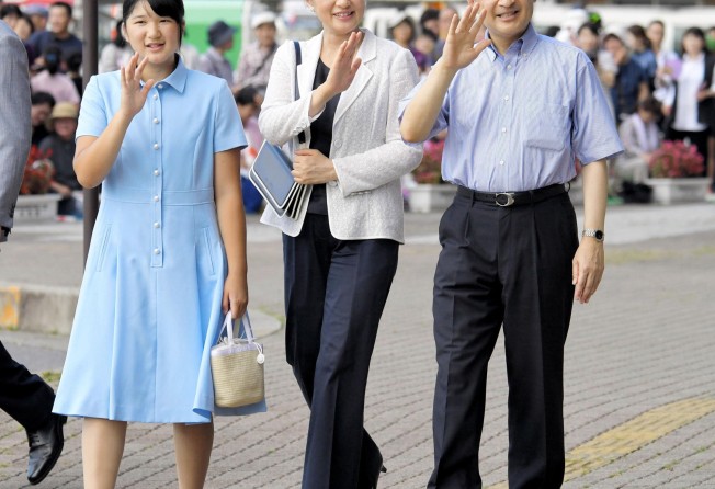 Japanese Emperor Naruhito, his wife, Empress Masako, with their only daughter Princess Aiko, who cannot ascend the Chrysanthemum throne. Photo: AP