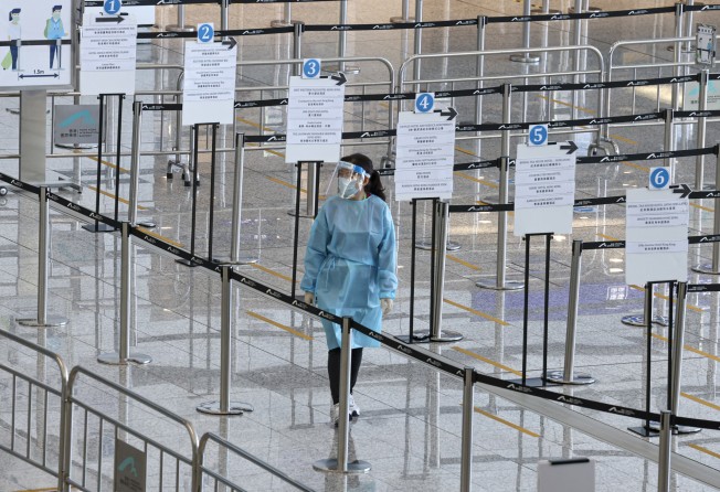 The arrivals hall at Hong Kong International Airport. All those from overseas or Taiwan must present negative coronavirus test results within 72 hours of flying to Hong Kong, leave within 24 hours and if unable to do so will be confined to a smaller isolation zone. Photo: K. Y. Cheng