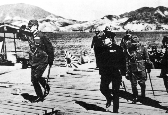 Lieutenant General Takashi Sakai (left), commander-in-chief of the Japanese forces in South China, at Quarry Bay pier in December 1941. Photo: Handout