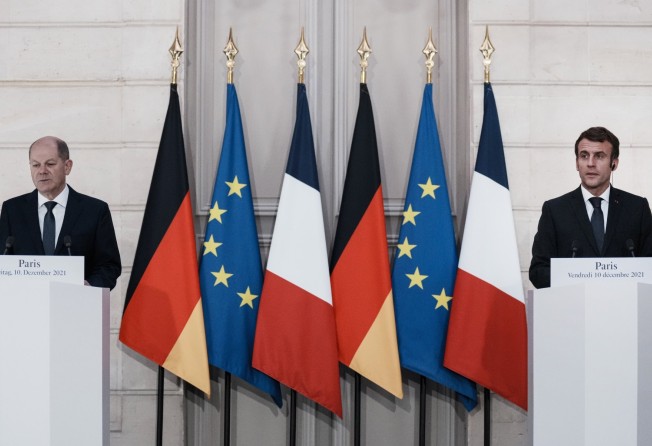German Chancellor Olaf Scholz (left) and French President Emmanuel Macron attend a media conference at the Elysee Palace in Paris on Friday. Photo: EPA-EFE