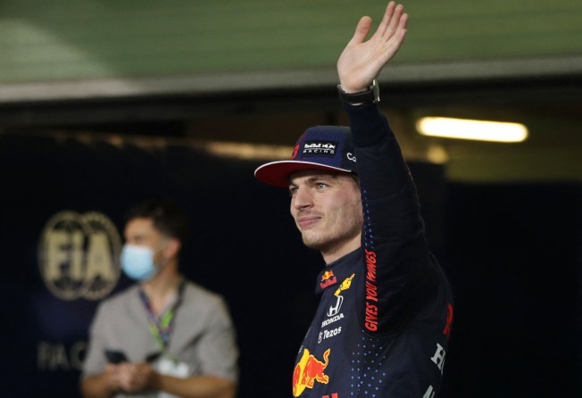 Max Verstappen waves to the fans after qualifying in pole position. Photo: Reuters