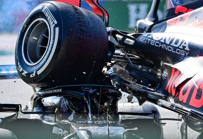 Mercedes’ British driver Lewis Hamilton (left) and Red Bull’s Dutch driver Max Verstappen collide during the Italian Formula One Grand Prix at the Autodromo Nazionale circuit in Monza. Photo: AFP