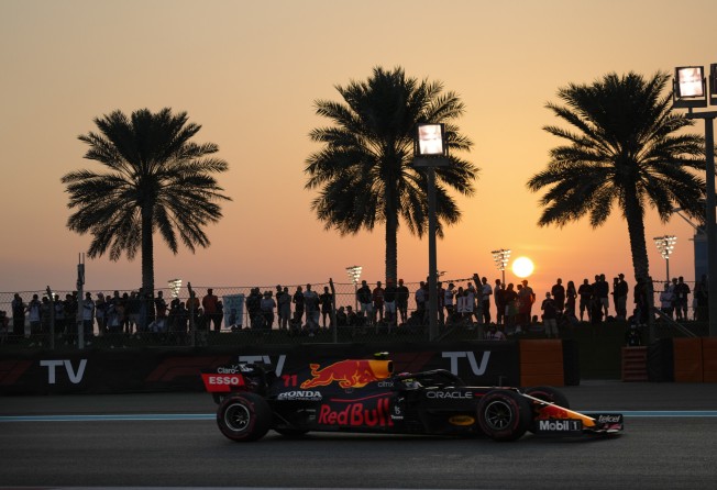 Crowds watch Red Bull driver Sergio Perez during qualifying for the Formula One Abu Dhabi Grand Prix. Photo: AP
