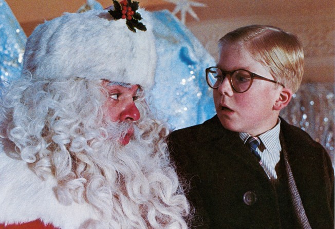 Peter Billingsley sits on Santa’s lap in a scene from A Christmas Story. Photo: Metro-Goldwyn-Mayer/Getty Images