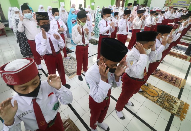 Students at a school in Kediri, East Java province. Photo: Antara Foto via Reuters