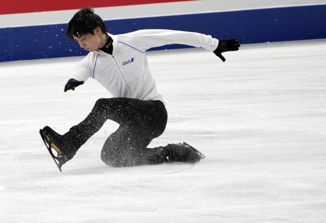 Japanese skater Yuzuru Hanyu stumbles during a practice session. Photo: AP
