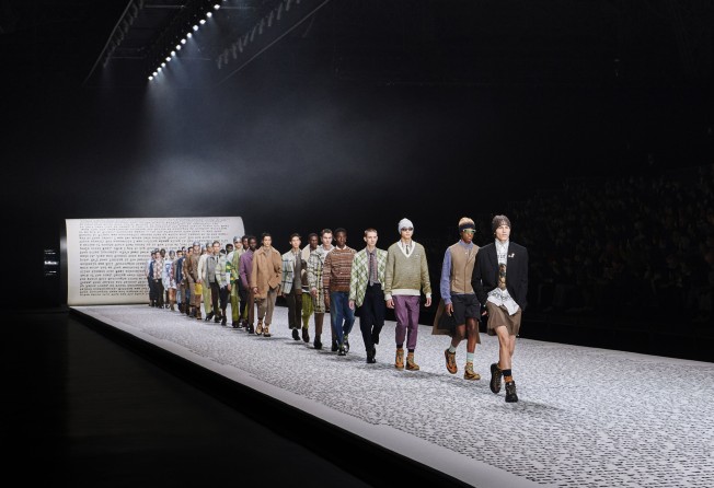 The Dior Men autumn 2022 show featured a runway displaying text from On The Road by Jack Kerouac.
