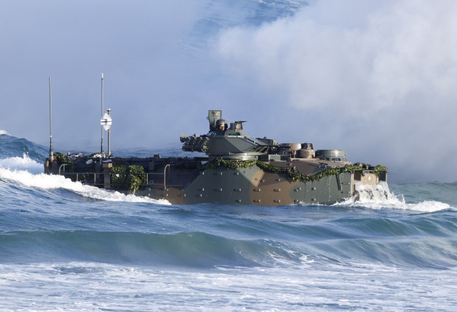 A Japan Ground Self-Defence Force (JGSDF) Assault Amphibious Vehicle (AAV7) during a joint exercise by the Japan Self-Defence Forces (JSDF) off the coast of Tanegashima island in Kagoshima on November 25. Photo: Bloomberg 