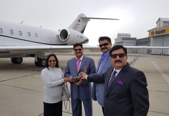 B.R. Shetty with his wife C.R. Shetty in front of their private jet. Photo: Seeandsay.in/Facebook