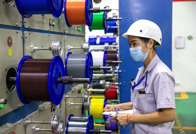 A worker checks tube bundles at the Thai-Chinese Rayong Industrial Zone in Rayong province. Photo: Xinhua