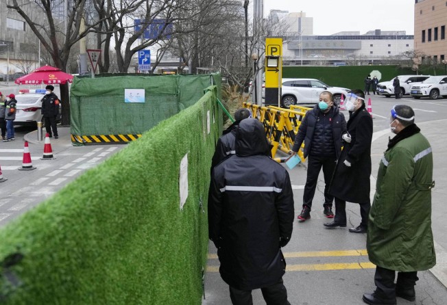 A makeshift fence in front of a hotel in Beijing for media personnel covering the Winter Olympics. Photo: Kyodo