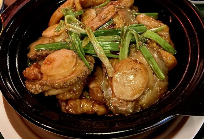 Our favourite dish of the night was the stewed chicken in clay pot with abalone, ginger and spring onions. Photo: Susan Jung