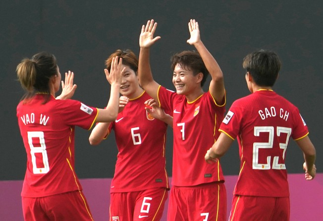 Wang Shuang (Centre) of China celebrates with teammates in a group game against Iran at the 2022 AFC Asian Cup at the Football Arena Mumbai in India. Photo: Xinhua