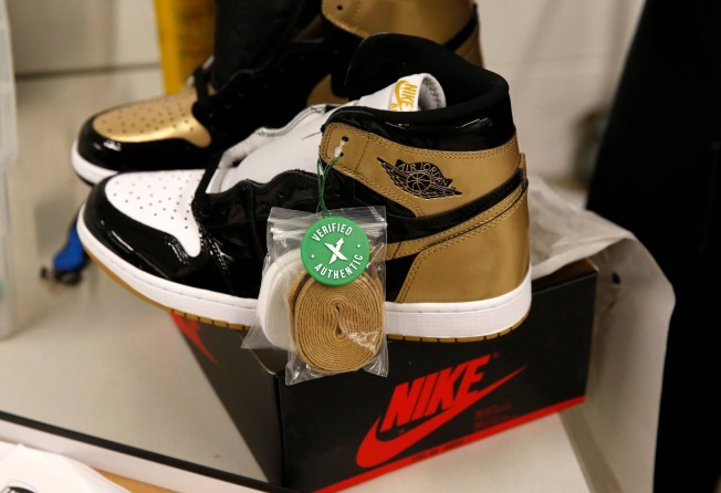 A pair of Air Jordan 1 Retro shoes sold on Stock X, a live auction site for resale of high-end sneakers, handbags, streetwear and watches. Photo: Jeff Kowalsky/AFP via Getty Images
