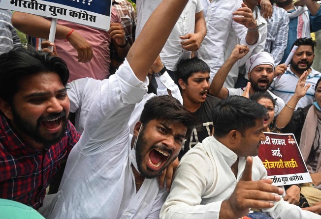 Members of India’s Youth Congress protest against rising unemployment. Photo: AFP