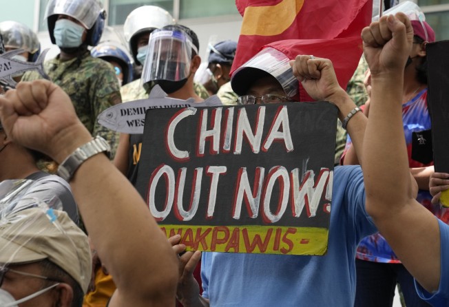 Filipinos protest against China’s actions in the South China Sea at a rally in front of the Chinese Consulate in Makati city, Philippines. Photo: AP