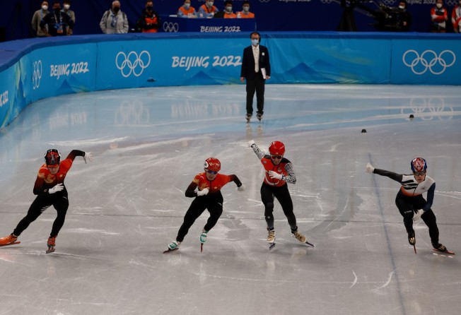 Ren Ziwei (far left), Li Wenlong, Akar Furkan of Turkey and Hwang Dae-heon compete in their men’s 1,000m short-track speedskating semi-final​. Photo: EPA-EFE
