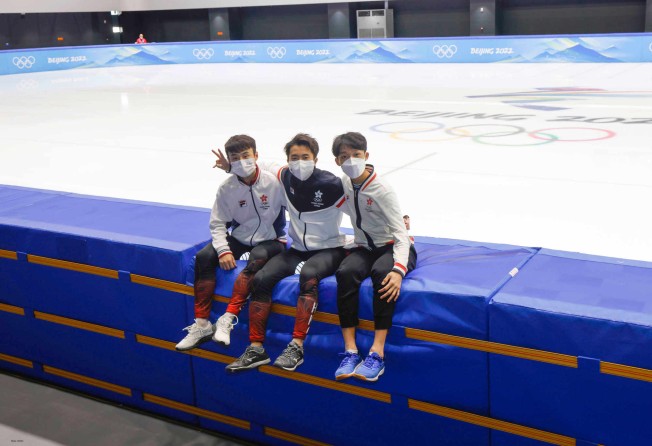 Hong Kong short-track speed skater Sidney Chu (centre) with teammates before the Beijing Winter Olympic Games’ men’s 500m event at the Capital Indoor Stadium. Photo: SF&OC