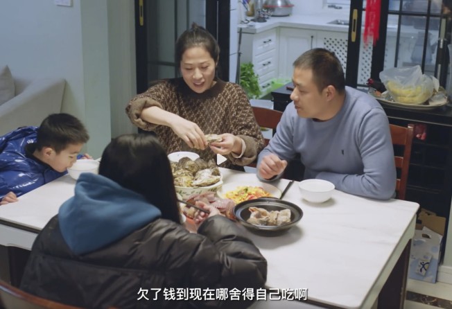 Champion mum Li with her family. Photo: Handout