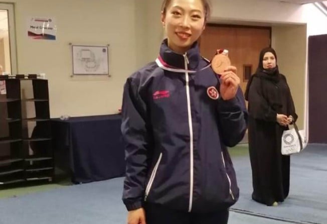 Angel Wong with her bronze medal in Doha. Photo: Handout