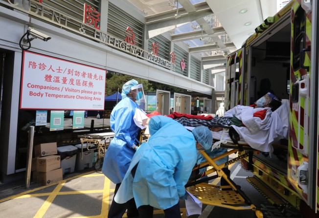 A patient is unloaded at the accident and emergency department at Queen Elizabeth Hospital on Tuesday. Photo: Jelly Tse