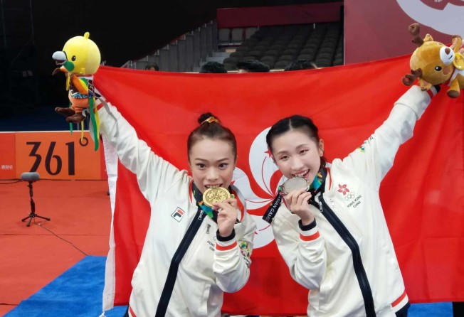 Yuen Ka-ying (left) and Juanita Mok celebrate with their medals at the Asian Games in 2018. Photo: Handout