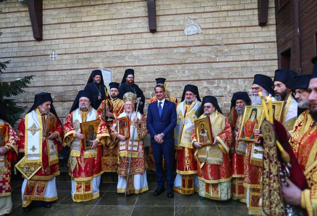 Greek Prime Minister Kyriakos Mitsotakis, centre, and Greek Orthodox Ecumenical Patriarch Bartholomew I, third from left, after a service at St George’s Church in Istanbul, Turkey on March 13. Photo: EPA-EFE