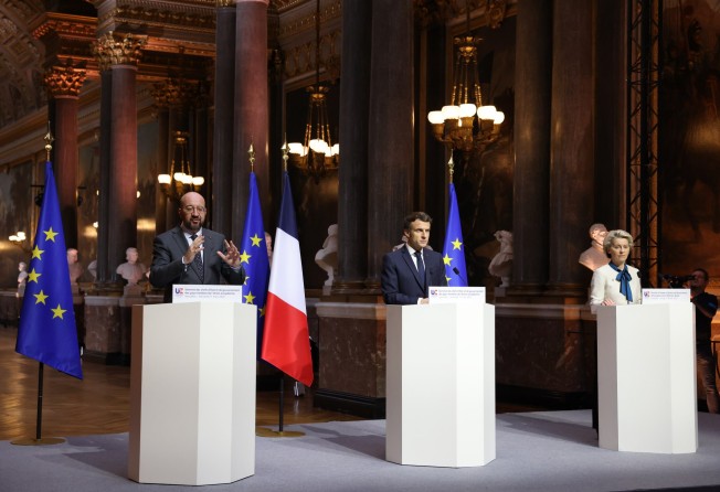 Left to right, European Council President Charles Michel, French President Emmanuel Macron and European Commission President Ursula von der Leyen speak at a press conference in Versailles, France, on March 11, after the meeting of the heads of states and governments of the European Union to discuss developments after the Russian attack on Ukraine. Photo: EU Council/DPA