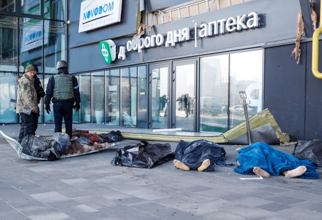 Four bodies outside a shopping centre in Kyiv, Ukraine on Monday after a Russian air strike. Photo: dpa