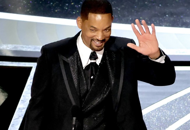 Will Smith accepts the best actor Oscar. Photo: AFP