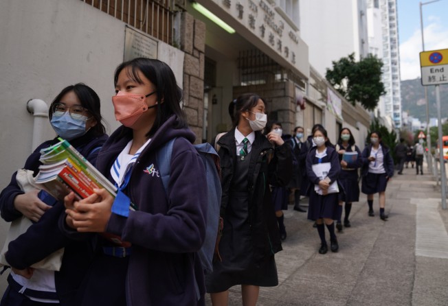 Secondary students leave their school in Hong Kong’s Shek Kip Mei district at the end of a school day on January 20. The stop-start nature of in-person schooling has stunted children’s education progress. Photo: Sam Tsang