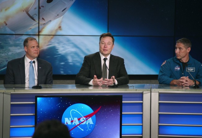 (From left) former Nasa head Jim Bridenstine, SpaceX founder Elon Musk, and Nasa astronaut Michael Hopkins in a still from Return to Space. Photo: Netflix
