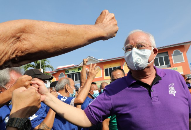 Najib Razak meets supporters in Slim River ahead of a by-election on August 23, 2020. Photo: Reuters