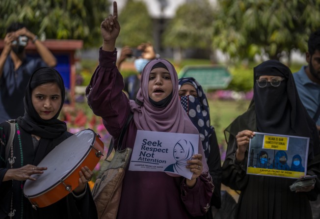 Muslim students shout slogans against the ban on hijab in some schools in the southern Indian state of Karnataka. Photo: AP