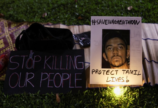 A poster of Nagaenthran Dharmalingam pictured at a Singapore vigil on Monday ahead of the planned executions of Malaysians Dharmalingam and Datchinamurthy Kataiah. Photo: Reuters