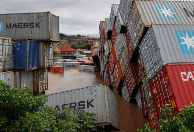 Containers that toppled at a storage facility in Durban, South Africa, on April 12, following heavy rains and winds. The port city, where nearly a fifth of Africa-China trade passes through, shut down because of flooding. Photo: AFP