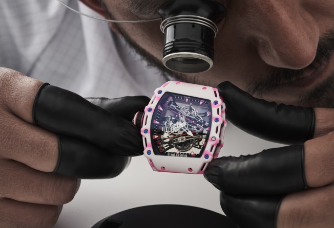 Richard Mille’s Tourbillon RM 38-02 features a case made of pink and white Quartz TPT, and Carbon TPT.