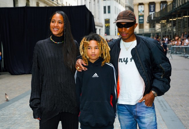 Helen Lasichanh, Rocket Ayer Williams and Pharrell Williams at the Balenciaga spring 2023 show. Photo: Getty Images