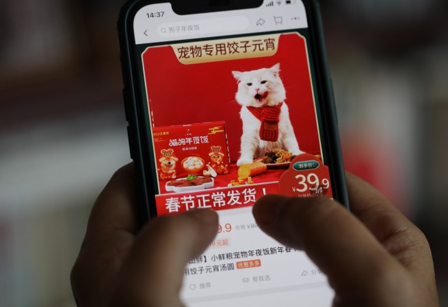 A woman uses the Taobao app in Beijing, Jan. 27, 2022. Photo: SCMP/Simon Song