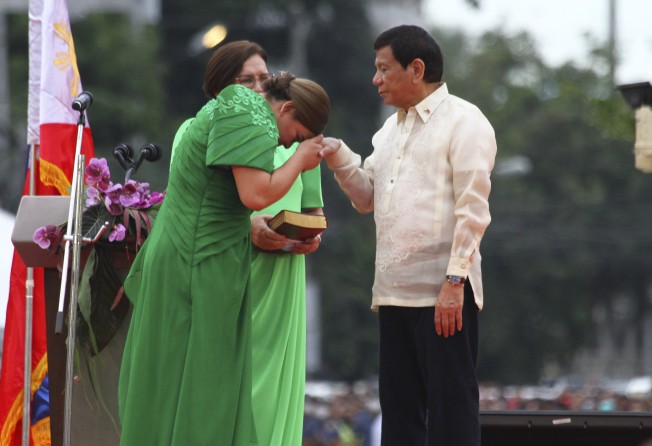 Sara Duterte and her father, outgoing Philippine President Rodrigo Duterte. Photo: AP