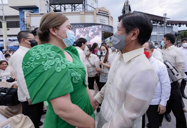 Philippines VP-elect Sara Duterte and President-elect Ferdinand ‘Bongbong’ Marcos Jnr at her inauguration ceremony in Davao City on June 19, 2022. Photo: EPA-EFE/PPD