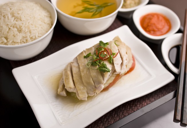 Hainanese chicken rice – very much a part of Southeast Asian cuisine thanks to Chinese immigrants Photo: Getty Images