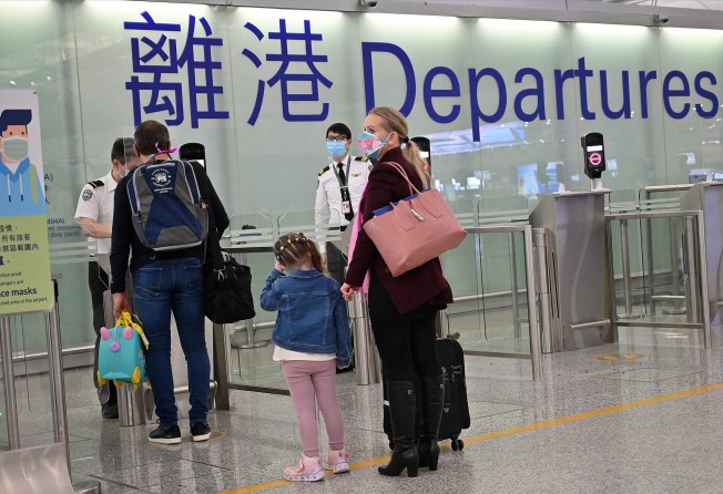 Expat families depart Hong Kong’s international airport. File photo: AFP